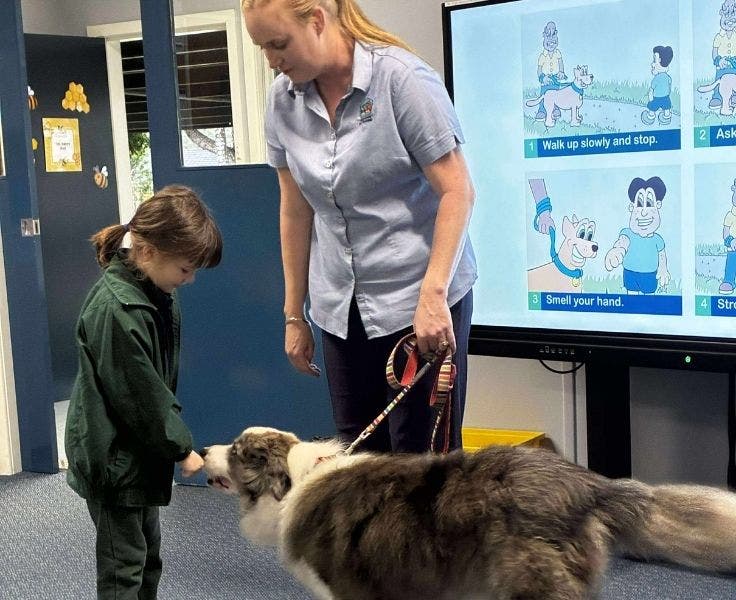 Year 1 student, the presenter and the dog.